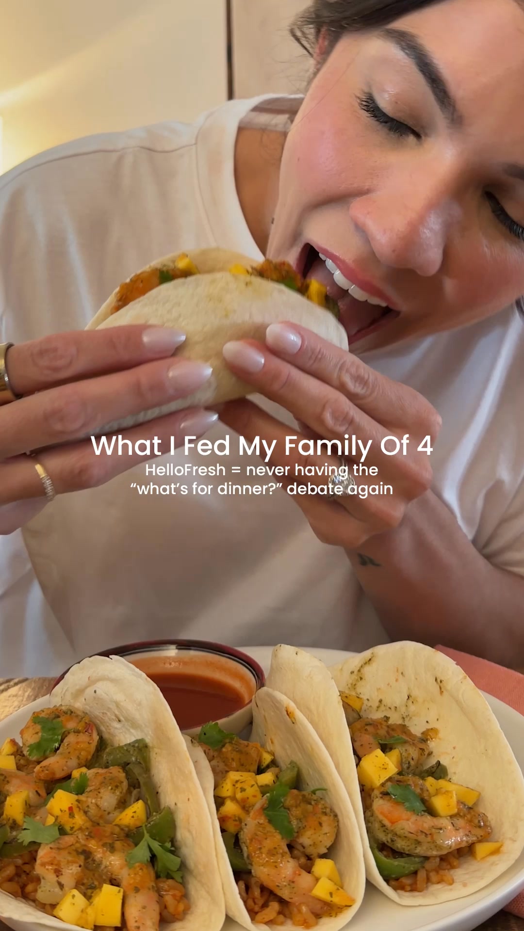 HelloFresh vertical ad showing a plated meal and recipe materials